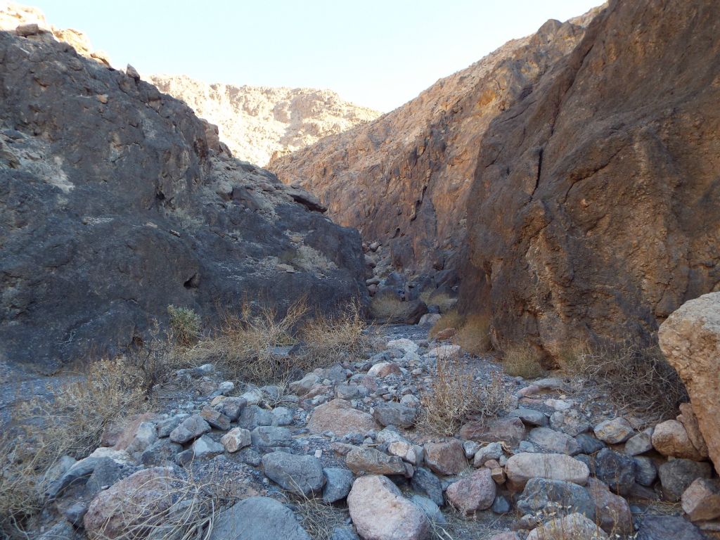 The canyon remained narrow with small boulders filling the wash: