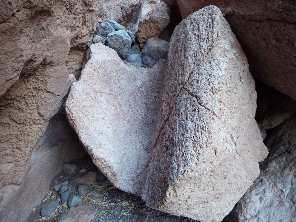 In the next two pictures, take note of how water has eroded and polished these boulders into small dry falls with flash floods through the years: