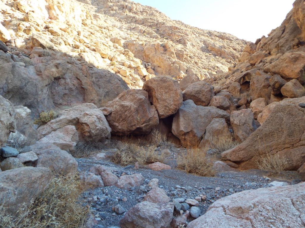 Navigating around a small wall of boulders: