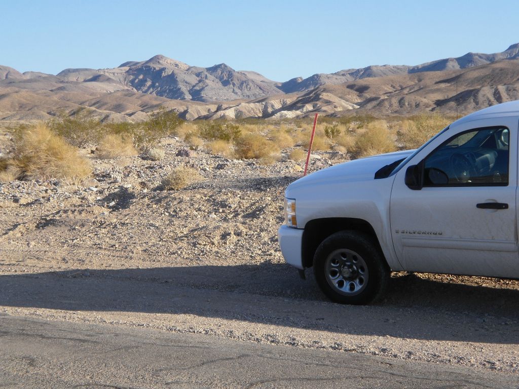 The parking area is located 29 1/2 miles up Scotty's Castle Road (also known as the North Highway):