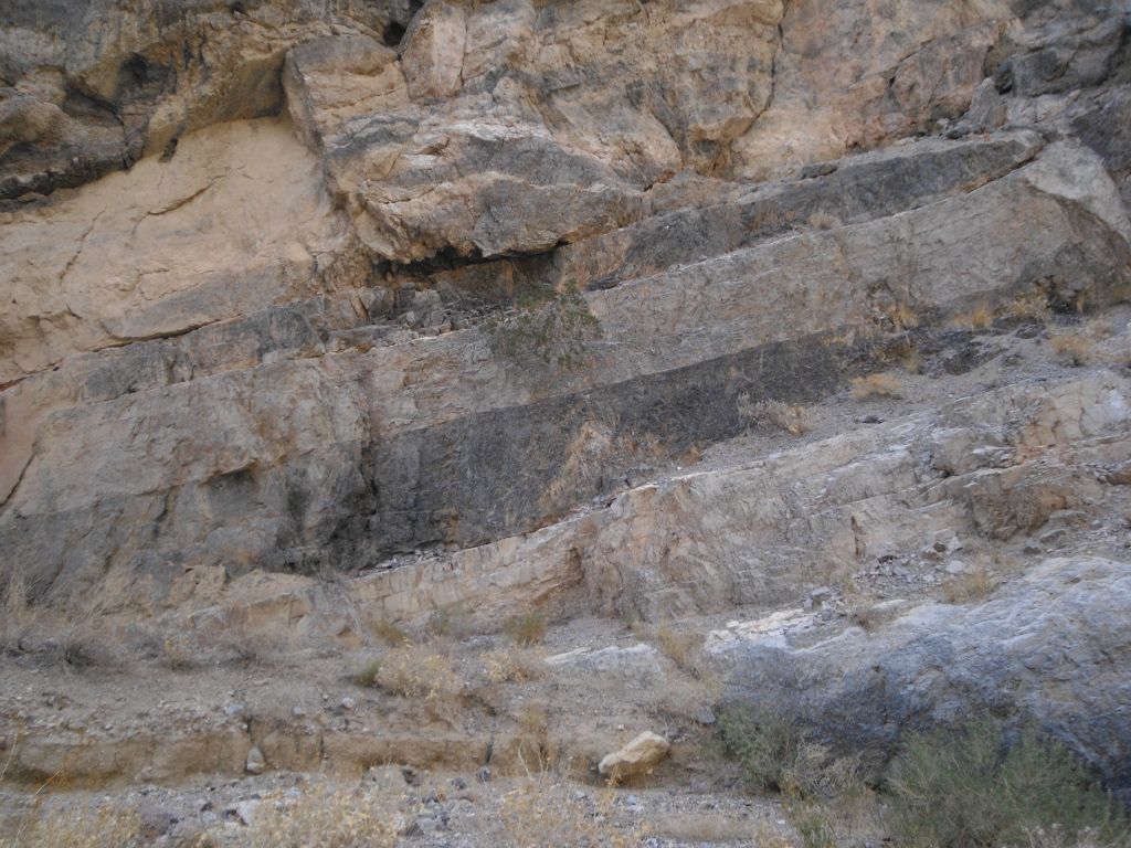 A closer look at some of the various colorful layers of rock on the canyon walls: