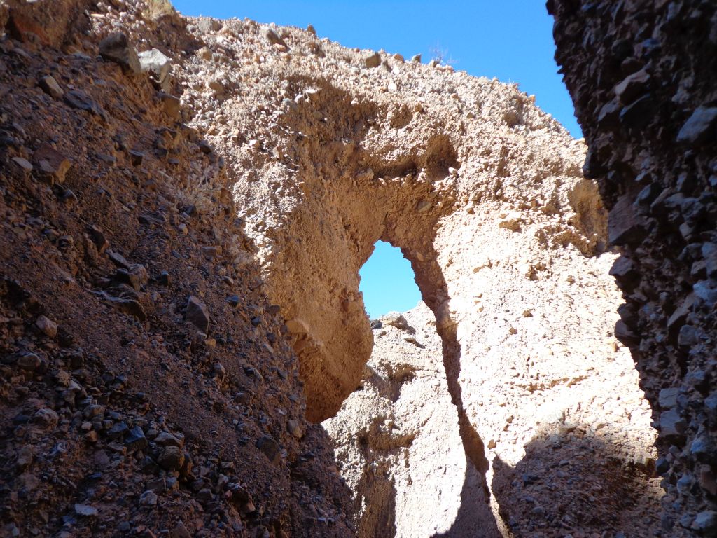 Three pictures showing Moonlight Bridge from the backside near the top of the dry fall: