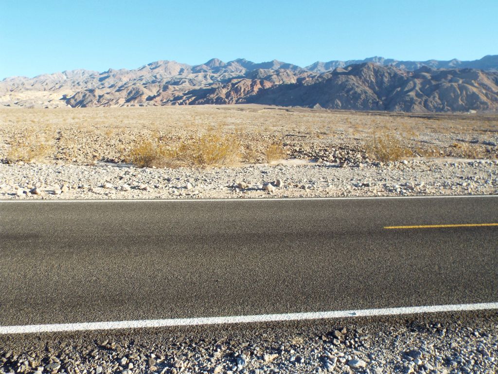 All but one of the following Red Wall Canyon photographs were taken from our November 2014 hike.  Here we have parked just before mile marker 19 on Scotty's Castle Road and are looking up at the long fan: