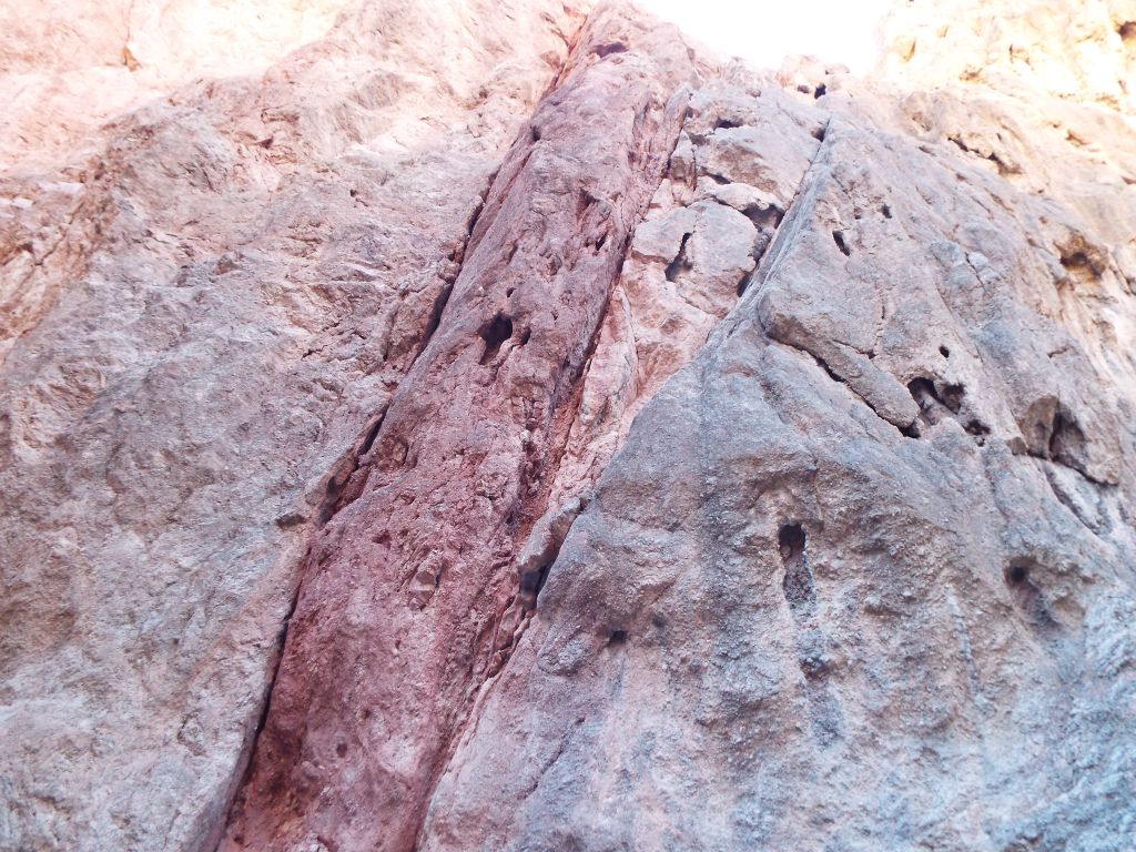 Two pictures showing colorful rock walls in the lower 1st Narrows: