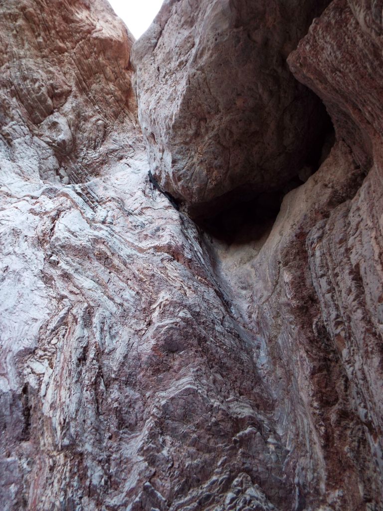 Climbers have to go up this slippery rock with very few holds and then maneuver themselves around the giant boulder.  No easy task, even for climbers.  For regular hikers, forget about it: