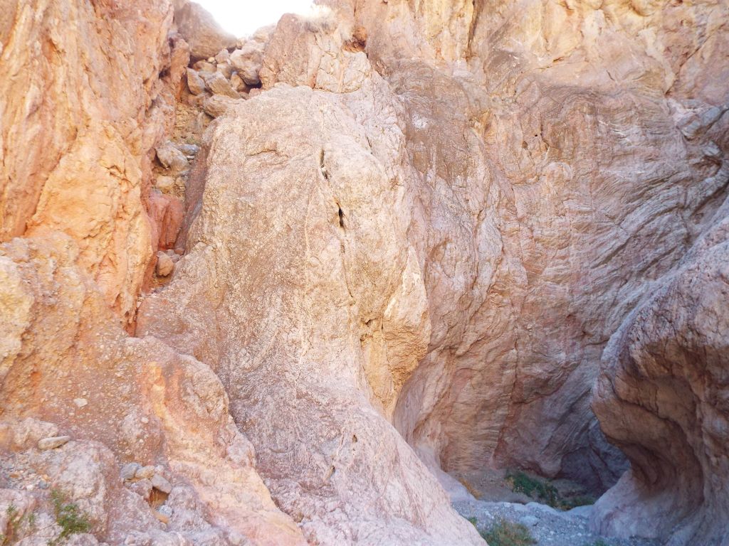Looking back up the final descent of the bypass.  At the top middle you can see the solid rock shelf which overlooks the narrows.  At the top left you can see the shelf of boulders with the chute we climbed down directly below it: