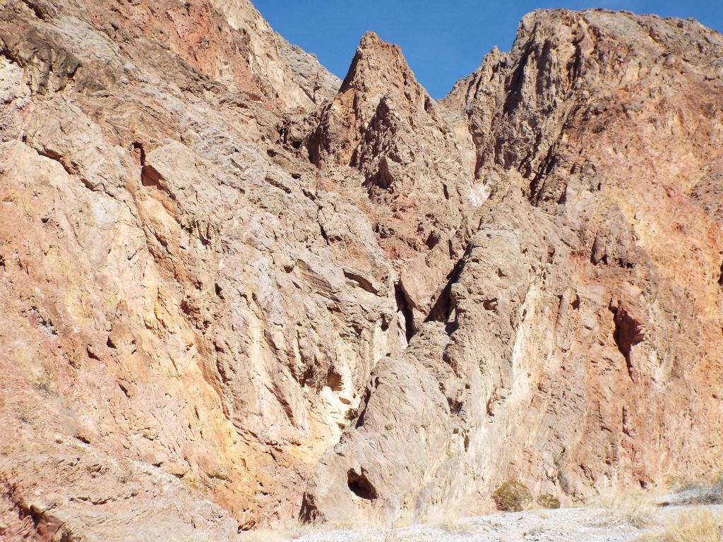 Rather than polished walls, the hillsides now contained small jagged peaks and formations: