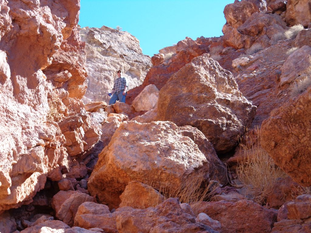 Charlie working his way up through the boulders in the bypass gully: