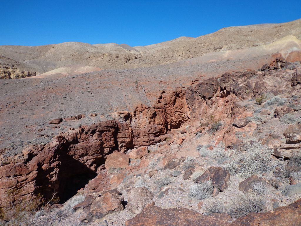 Once at the top, we had to cross over above the canyon to get back into the wash above the dry fall: