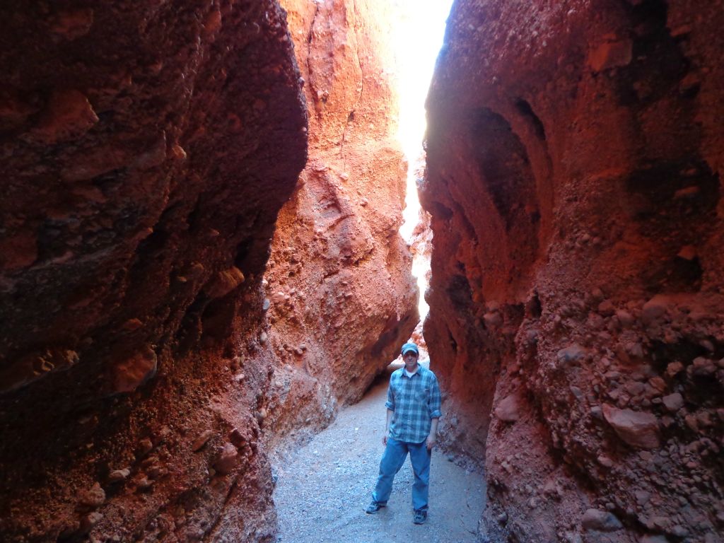 A picture of Charlie walking up the first section of slot narrows: