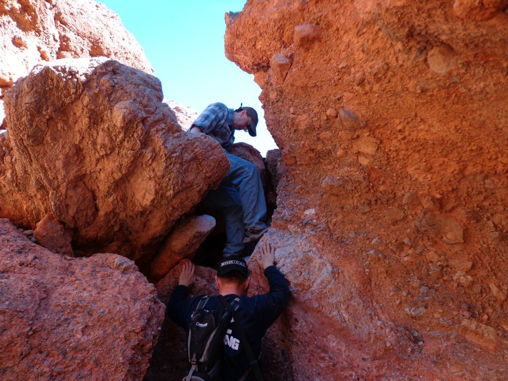 Tobin helping Charlie work his way down the dry fall in the upper canyon: