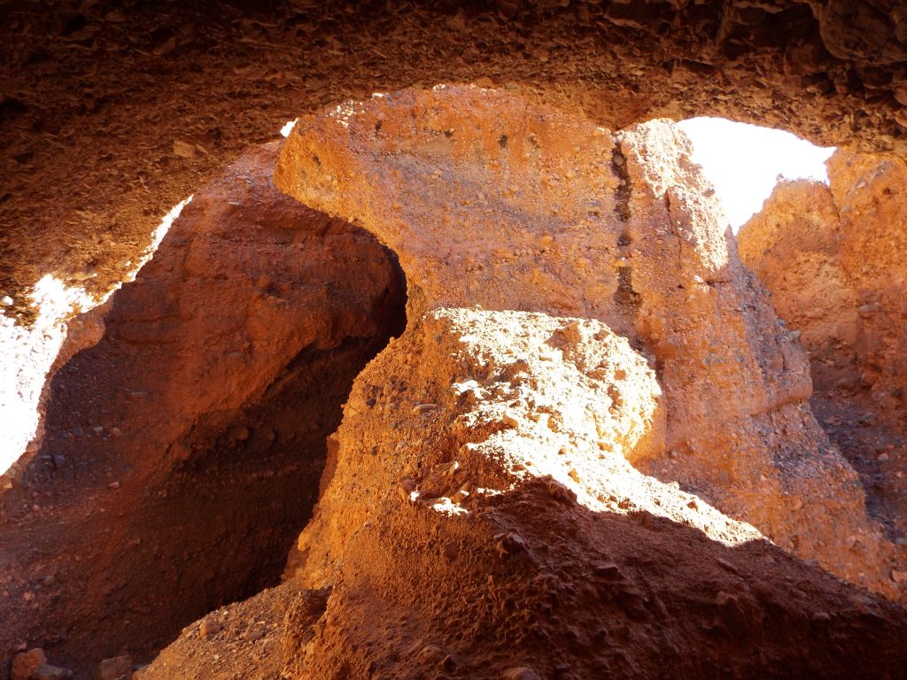 Standing under an overhang looking out at a very scenic spot in the canyon: