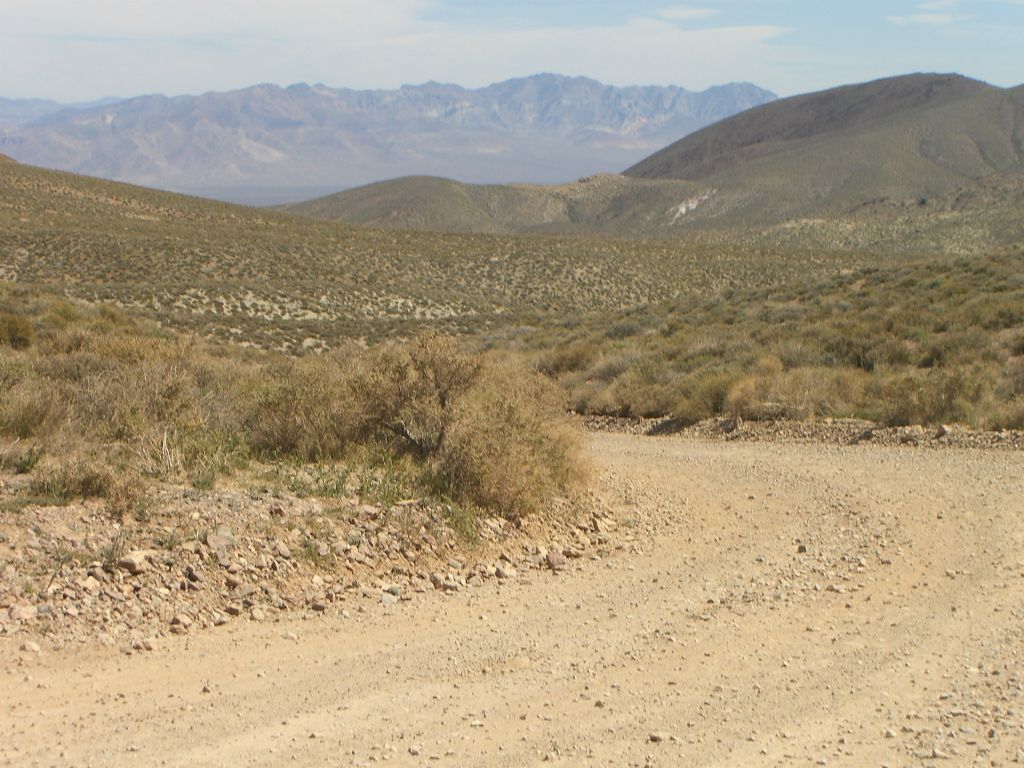 From White Pass, the Bare Mountain Range in Nevada is visible through the foothills by looking to the east: