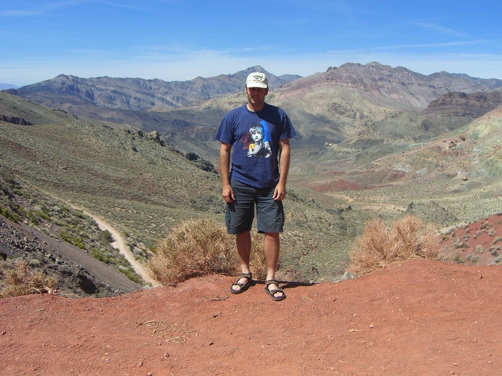 Steve at Red Pass standing directly below the summit bump of Mount Palmer: