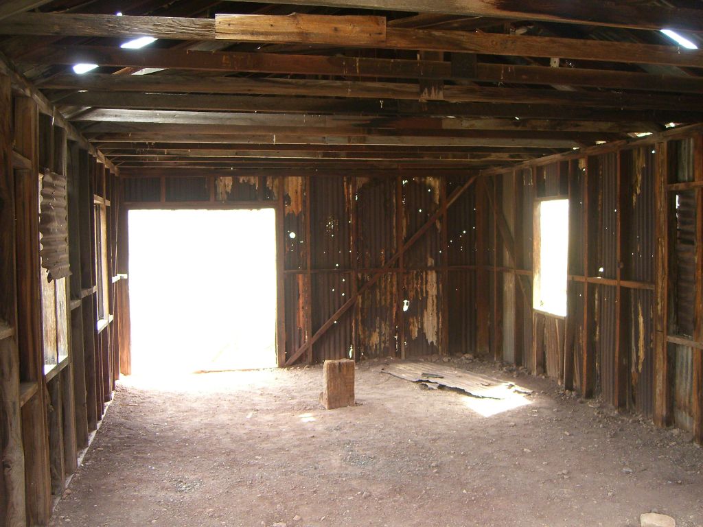 Two pictures of a larger structure which is still standing: