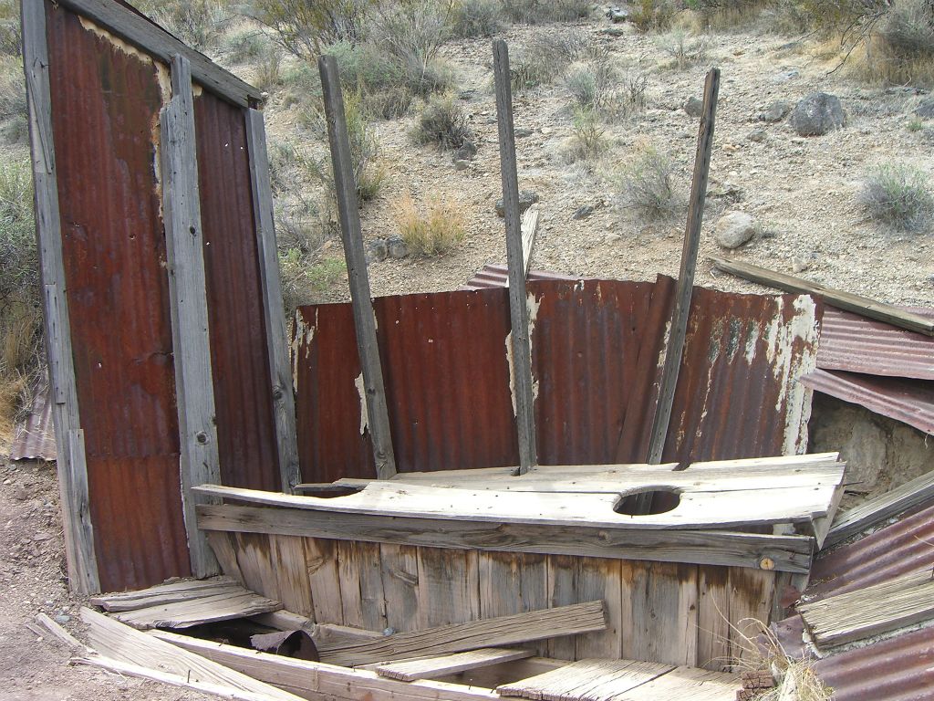 Can you figure out what this building was used for by looking at the cutouts on the wood?: