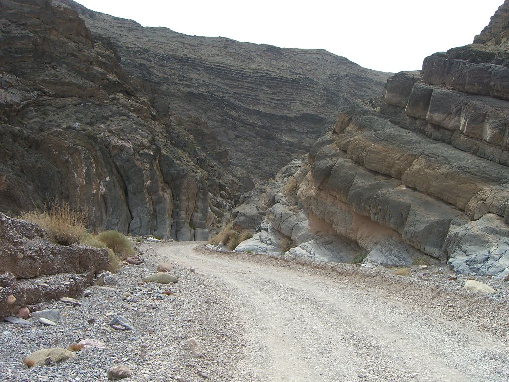 On the right side, it looks like the canyon wall has huge rock steps or blocks: