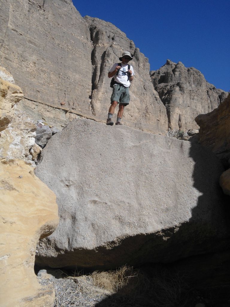 Charlie up and over the massive wedged boulder with ease: