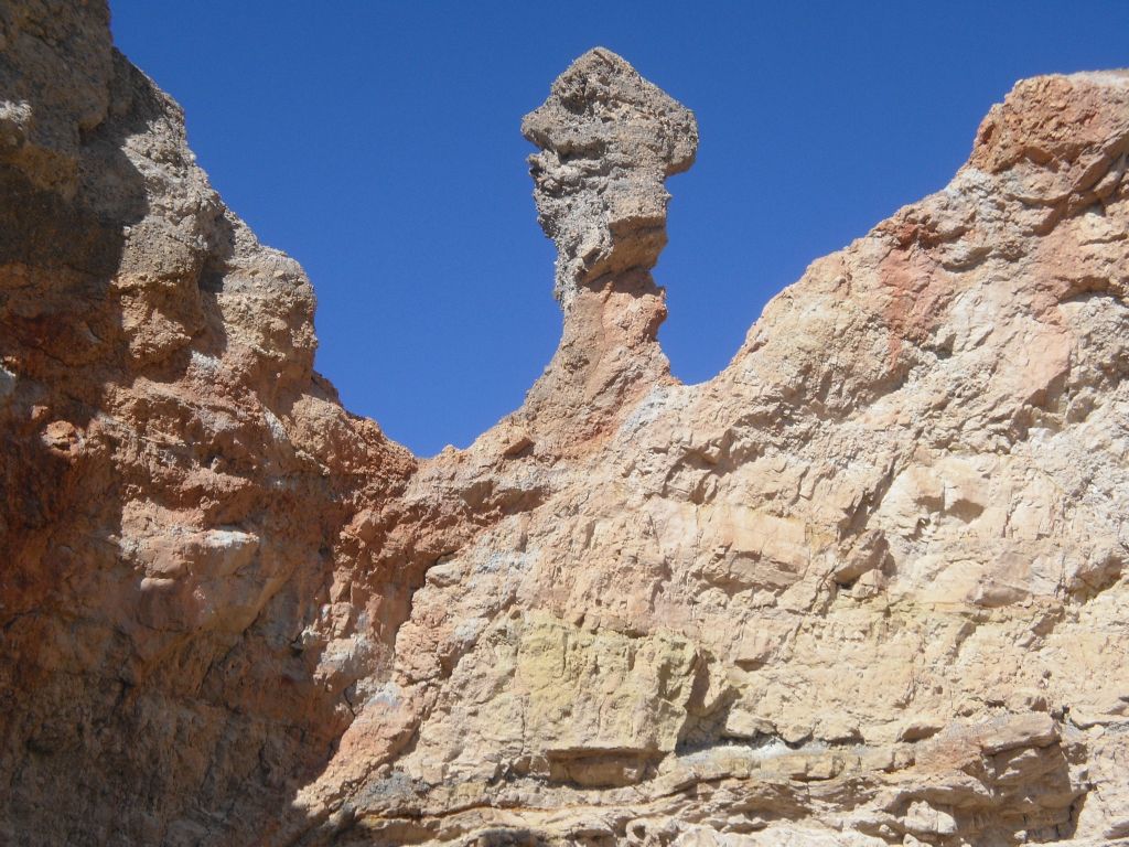 The next two pictures show a very large pinnacle or spire that we walked by: