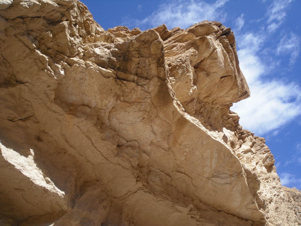 A massive overhang sticking out into the middle of the canyon:
