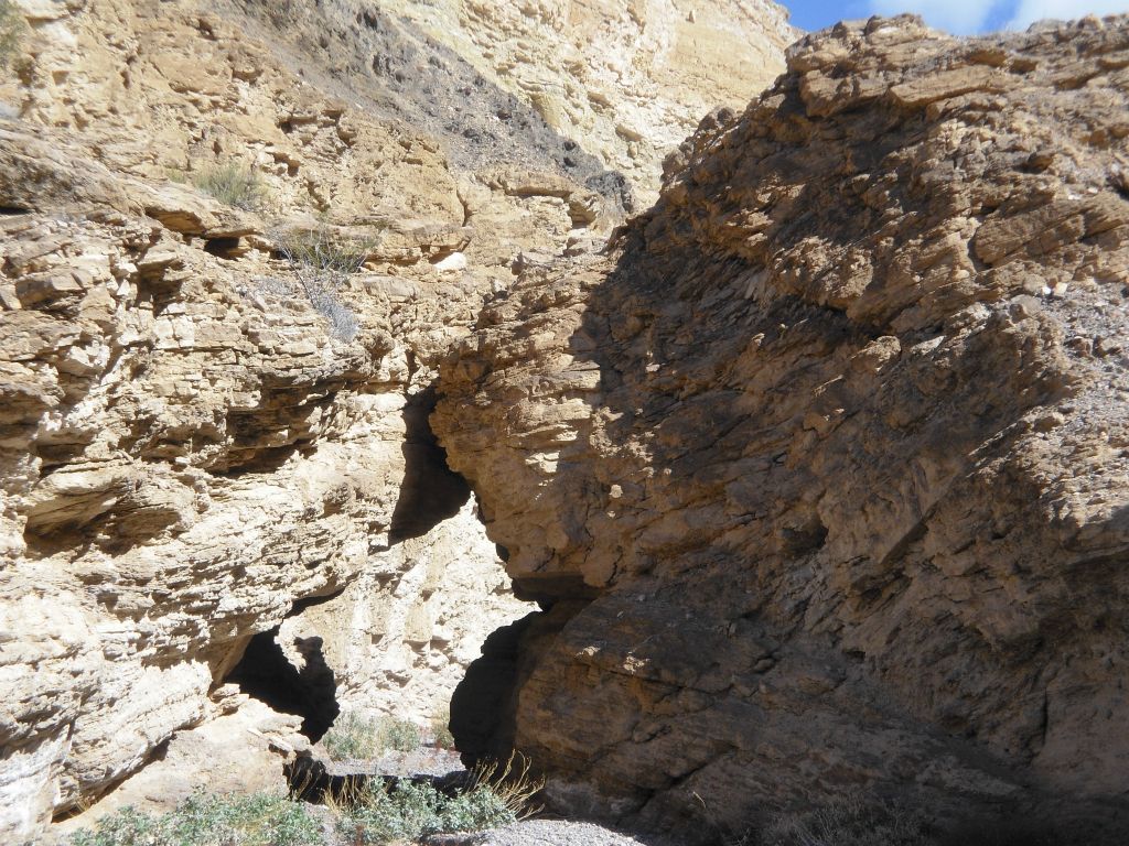 We rounded a bend and were absolutely stunned to be looking through a large unexpected natural bridge.  Sometimes it pays off to explore new places, instead of just following where others tell you to go:
