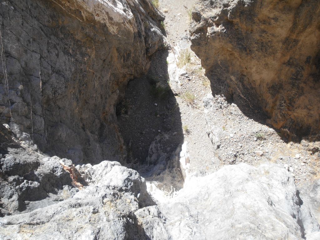 Looking straight down the 4th dry fall at the canyon wash below: