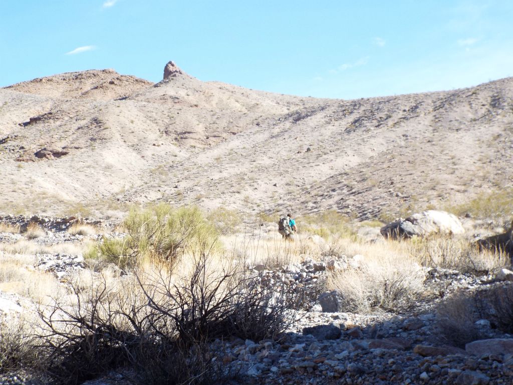 Our hike started out at the end of Red Wall Canyon's 3rd Narrows.  On the lower right, you can see exit rock and at the upper left, you can see crossover rock: