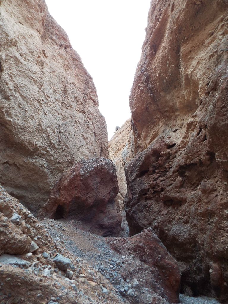 Notice how the passage at the bottom right heads straight into a slot between towering walls: