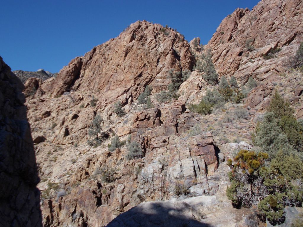 The challenging bypass would go up and around the hillside in this picture, staying a ways below the base of the rock wall seen in the distance: