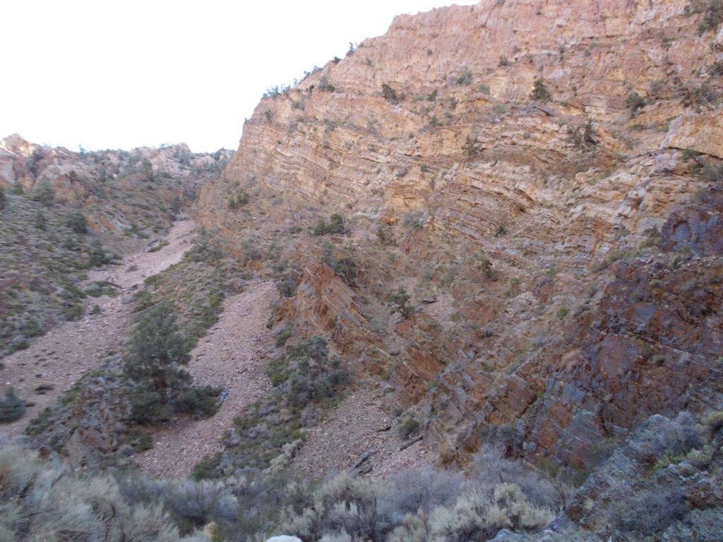 A neat area with three different rock slides coming down from the mountain: