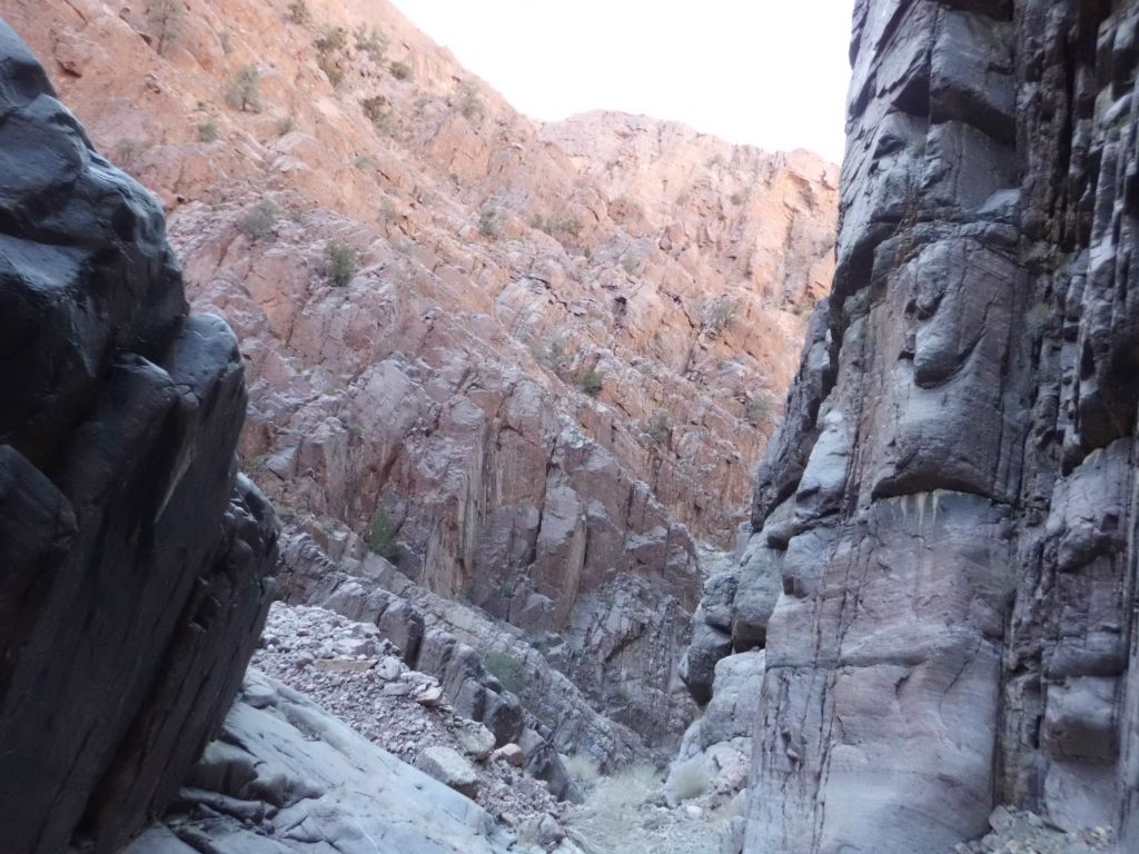 The cliffs and peaks high above the canyon would come into view once in a while: