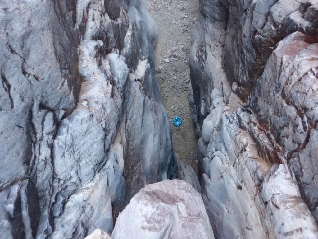 Looking down at the base of the 3rd dry fall.  Notice that a balloon is down at the bottom, but we had no way to get down there to pack it out: