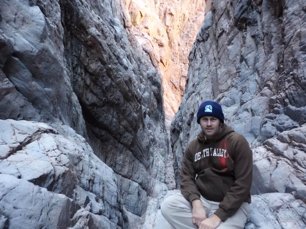If you look just to the left of me, you can see down the wash passage and how these are true slot narrows.  The slot narrows of Moonlight Canyon are probably my favorite single spot of any canyon in the park: