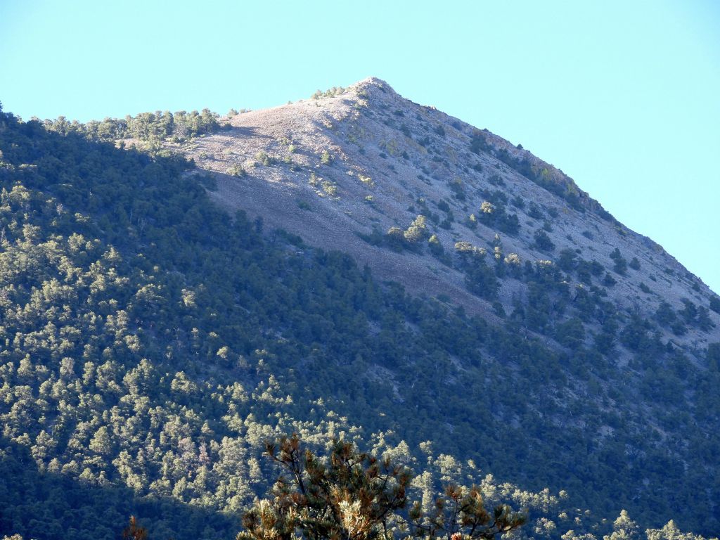 Zooming in on the distant summit located 2,000 feet in elevation above the campground: