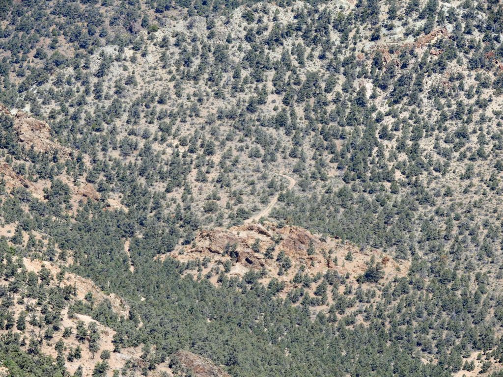 Zooming in far below, we could see where Phinney Canyon Road makes its final turn and heads for the saddle: