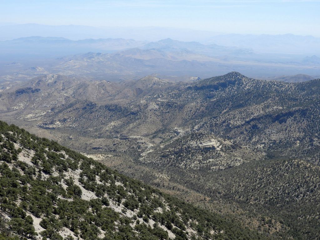 Zooming in a little bit, the prominent little peak at the top center of the picture is Sawtooth Mountain (6,005 feet) which is the high point of the Bullfrog Hills: