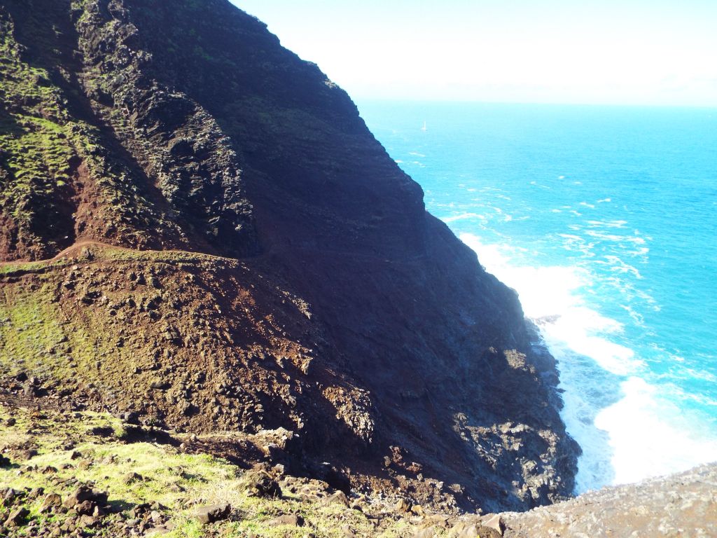 Just beyond the downhill switchbacks is the dreaded Crawler's Ledge, seen here from a distance (in the shadow):