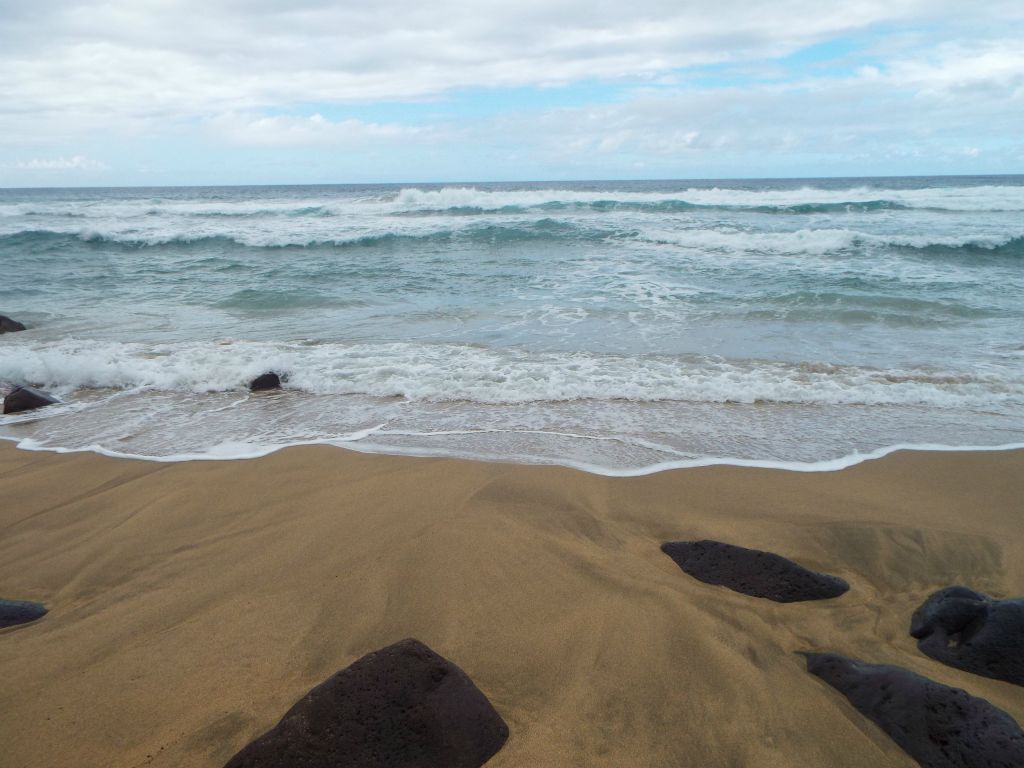 The spectacular beauty of Kalalau Beach is best enjoyed from the shore as there are riptides and strong currents: