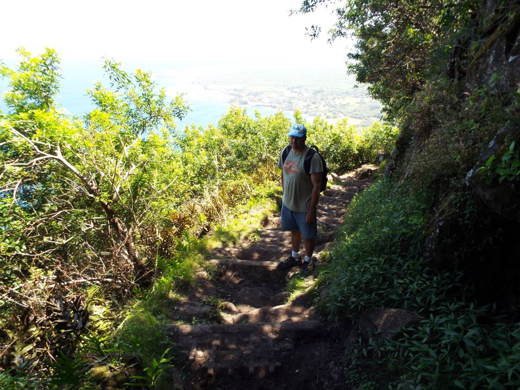 A picture of me taken at the same spot as the previous picture.  I liked this angle because it showcased both the trail steepness and the great views: