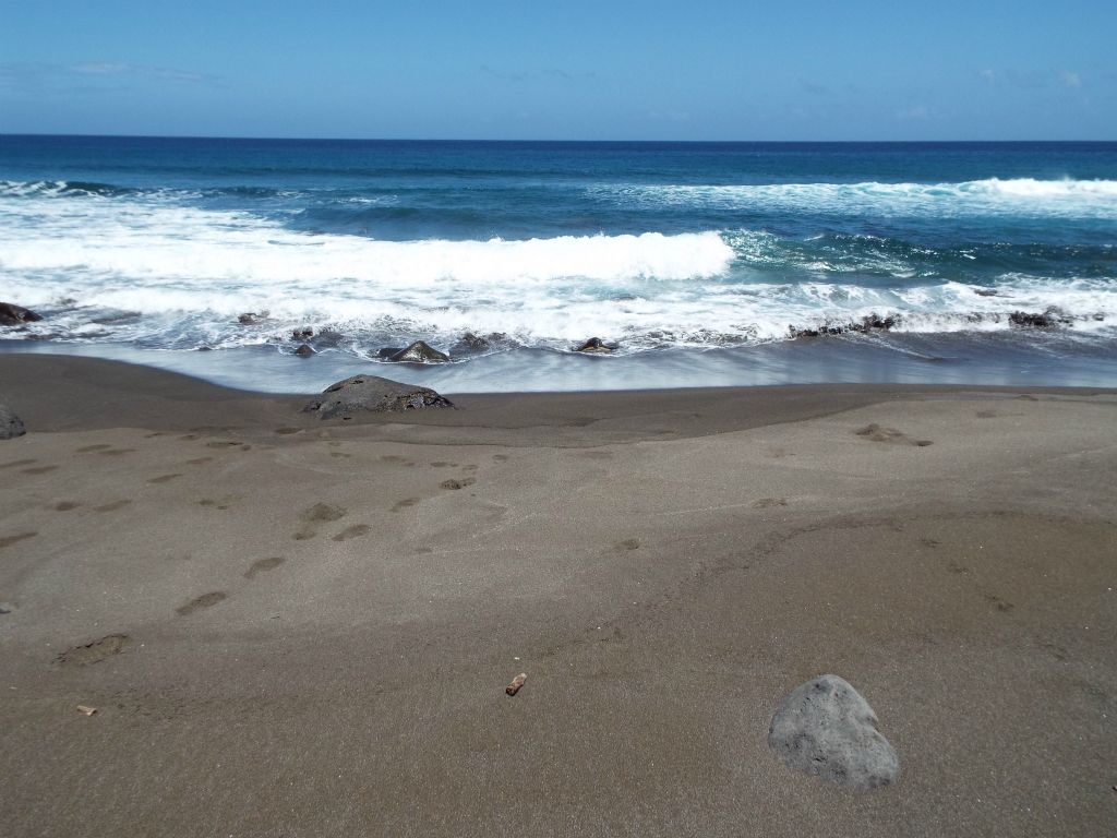 The abundant rocks of the beach finally gave way to an abundance of sand: