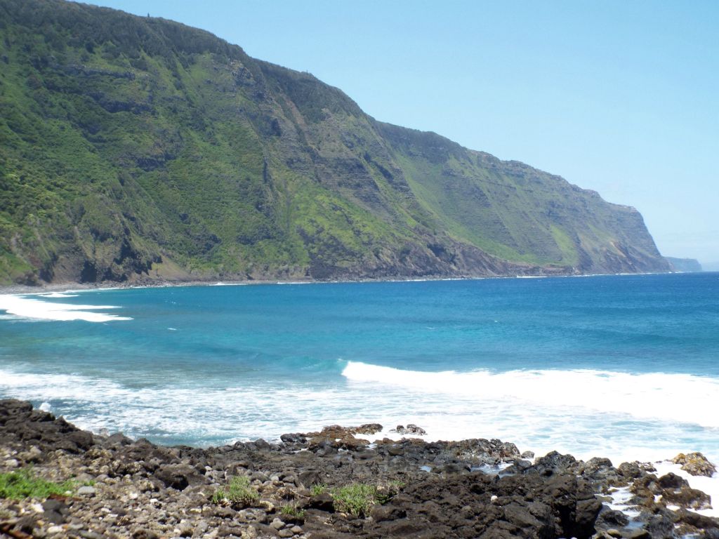 Zooming in to appreciate the magnitude of the sea cliffs:
