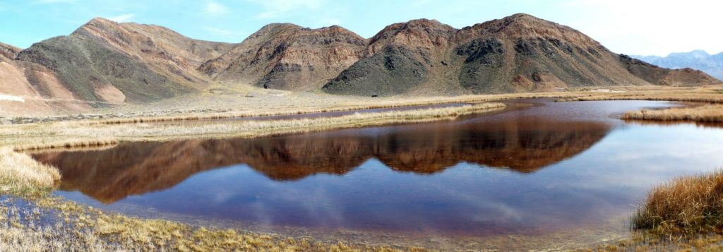 Panoramic showing spectacular reflections on the Saratoga Spring ponds: