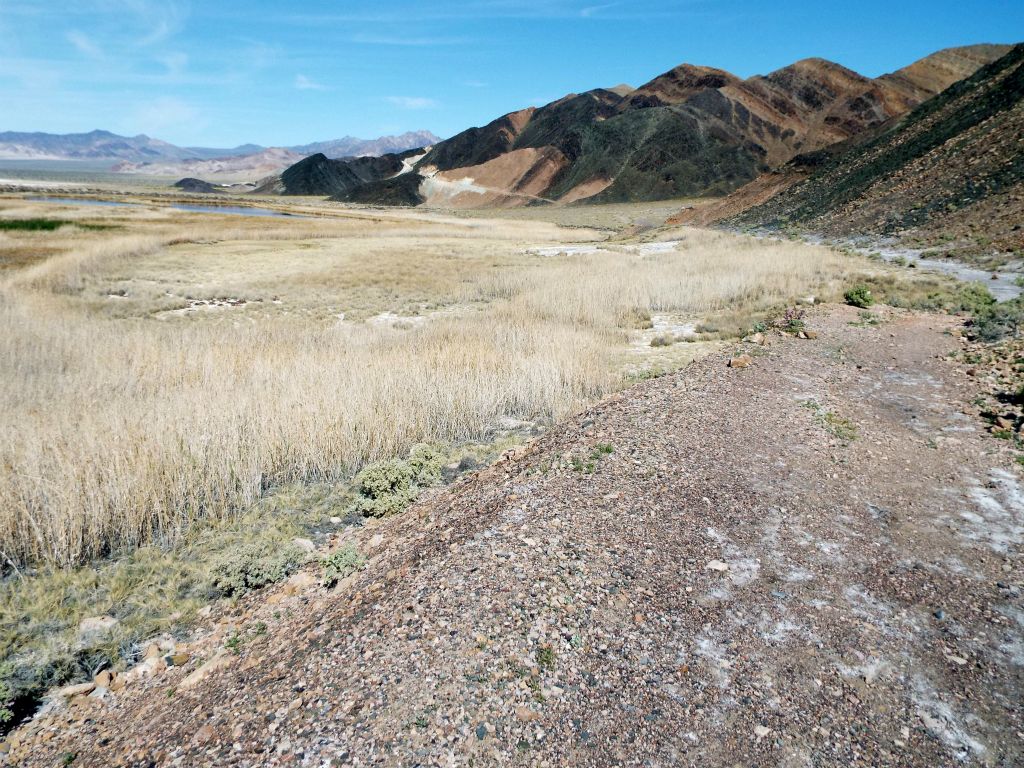 The most obvious path around Saratoga Spring is on the east side along an old mining road which is now closed: