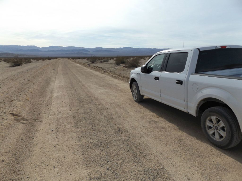 There isn't a lot of space for passing vehicles at the parking area along the Harry Wade Road: