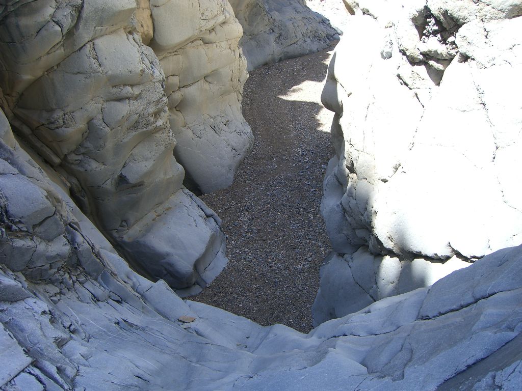 At the start of the second side canyon narrows, there is a dry fall which must be downclimbed.  Some people have had trouble with this one, but for most people it is easy: