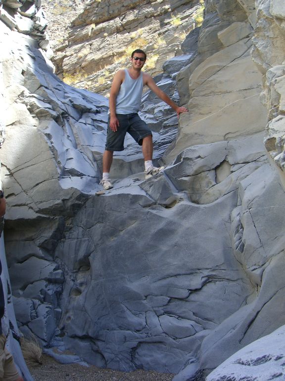 This picture of Lowell standing at the top of the dry fall gives you a good look at both the height and difficulty: