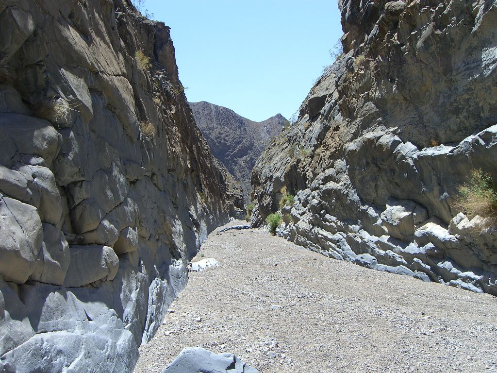 Notice how some of the rocks which form the canyon walls seem to bulge out: