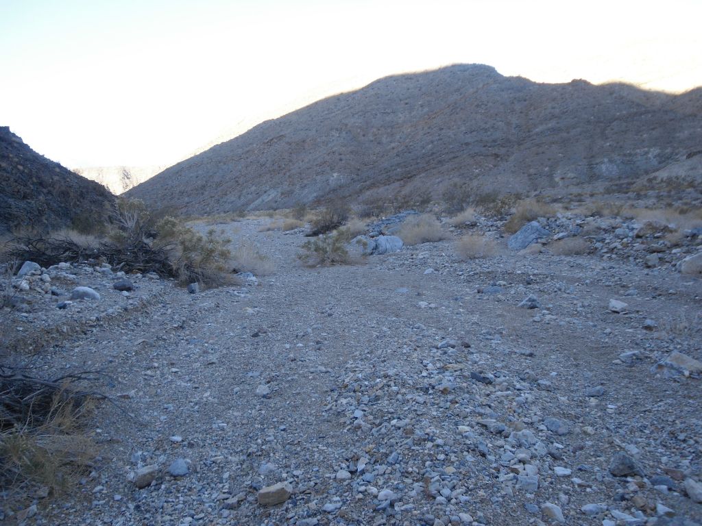 After the narrows, the area opens up wide with two options.  Straight ahead leads to the second side canyon which ultimately drains into The Corridor, while turning right leads into Round Valley: