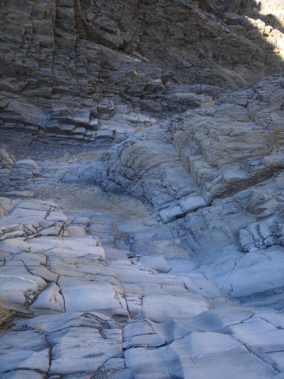 Polished solid rock forming the canyon floor to walk on: