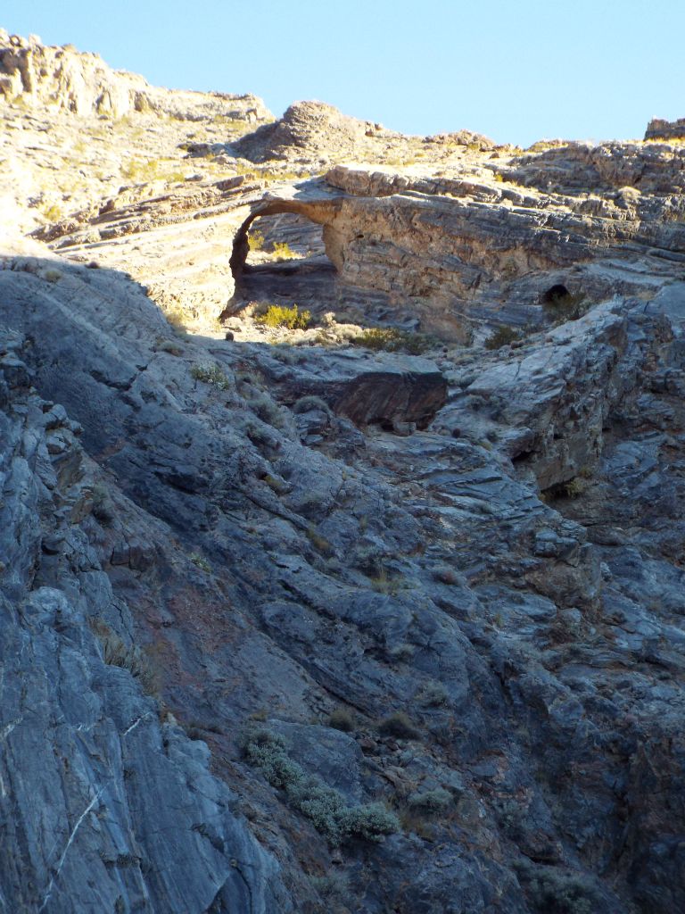 In the bottom portion of this picture, you can see how the cliffs form just below the arch and quickly grow in height.  Hiking around this area really requires great caution and care: